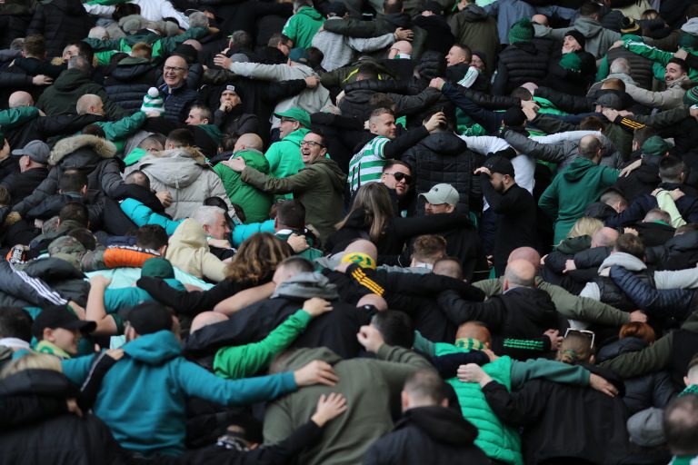 Celtic fans huddle