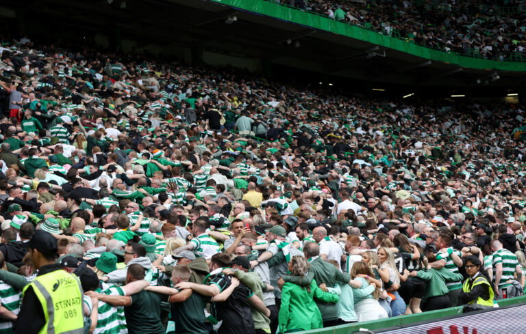 Celtic fans huddle